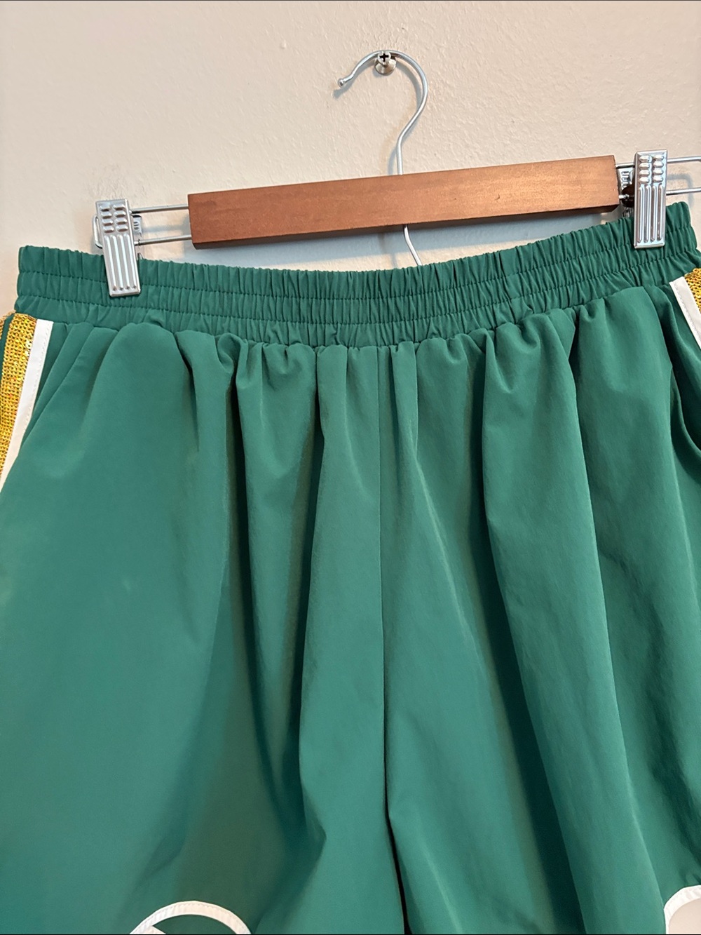 QUEEN OF SPARKLES Green Athletic Shorts with White Trim and Gold Side Stripe - Picture 4 of 8